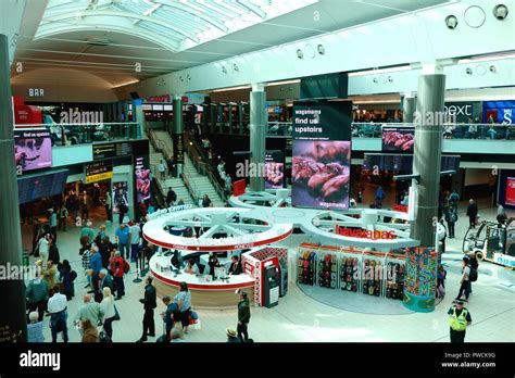 Shops and restaurants in departure lounge of Gatwick Airport South ...