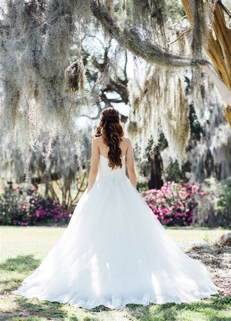 This sweet southern belle got married in Charleston, SC and her bridal portraits were just draw ...