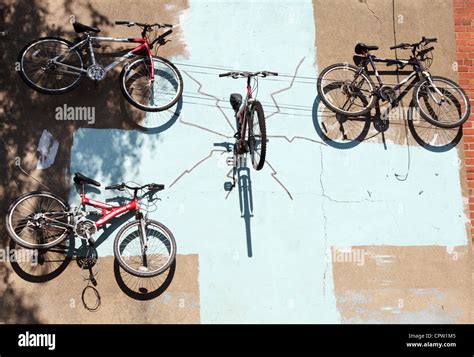 Bicycles attached to the wall of Yates Cycles Malton, Yorkshire ...