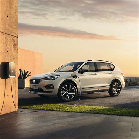 SEAT Tarraco e-HYBRID charging into the sunset : r/seat