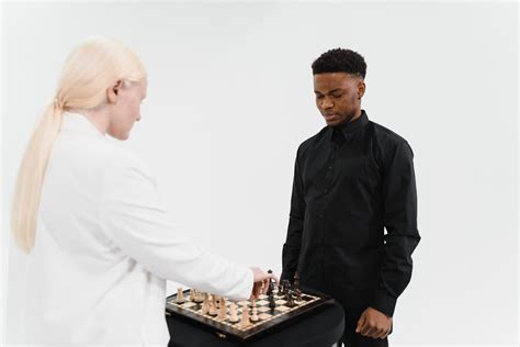 Man and Woman Playing Chess · Free Stock Photo