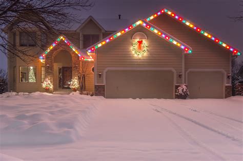 Winter Home with Holiday Lights and Tracks - David J Frank