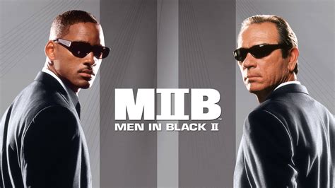 Download Men In Black II Movie Poster Wallpaper | Wallpapers.com