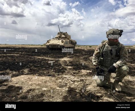 Pvt. Tyler Yorgesen, A Company, 116th Brigade Engineer Battalion, takes ...