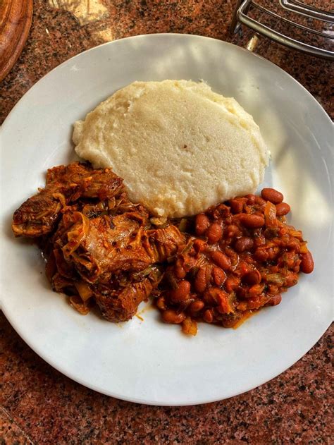 Sadza and goat (mbudzi) Zimbabwe food | Zimbabwe food, Africa food, Food