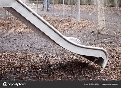 Metal Slide Park Blurred Background Stock Photo by ©Wirestock 350842938