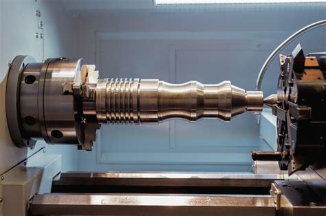 Premium Photo | Machining of parts on a lathe.