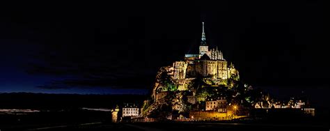 Mont Saint Michel at night panorama Photograph by Weston Westmoreland - Fine Art America