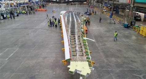 Beyond the carrier deck: A glimpse at the 777X folding wingtip - The Air Current