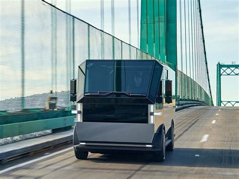 Canoo unveils $33,000 electric delivery van, teases electric pickup ...