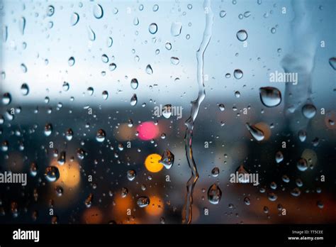 City lights through rainy day window Stock Photo - Alamy