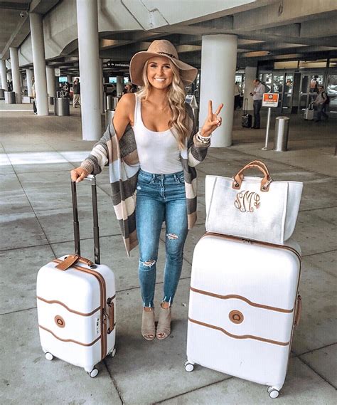 Travel outfit, airport style, white matching luggage and travel look ideas // comfy fall ...