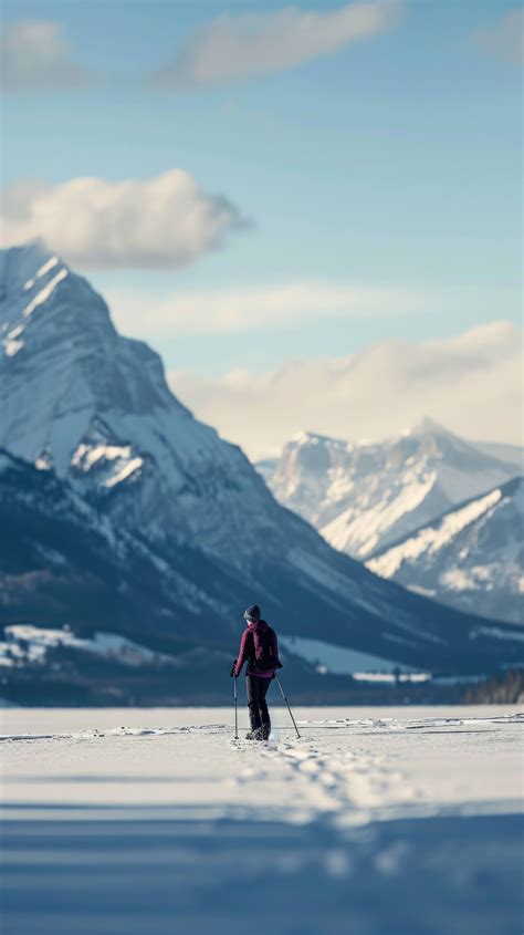 winter hiking, person hiking in snow, mountain winter landscape, snowy ...