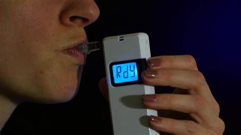 breathalyzer test reads over legal limit Stock Footage Video (100% ...