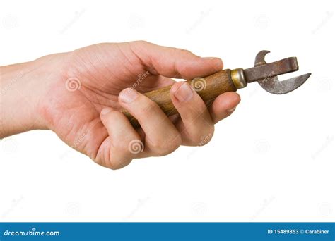 Old can opener in hand stock image. Image of instrument - 15489863