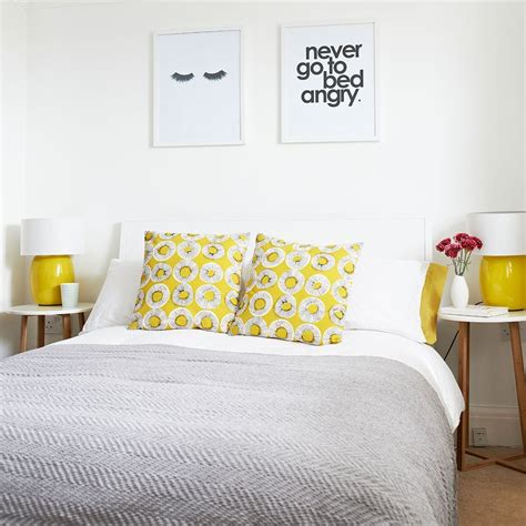 Yellow bedroom Modern - White bedroom with yellowprint cushions and ...