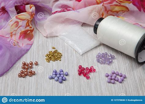 Stringing beads stock photo. Image of making, green - 127276846