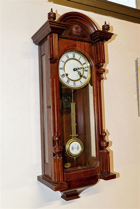 Antique Pendulum Clock In Inlaid Wood Photograph by Cardaio Federico - Pixels