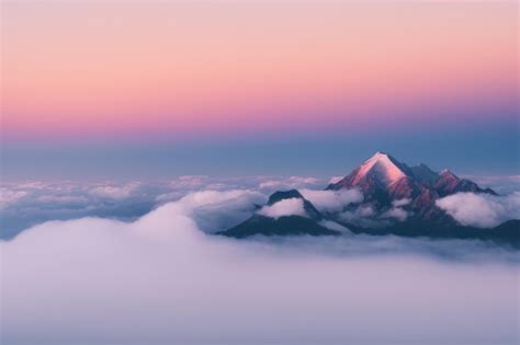 Premium Photo | Sunrise over the mountains over the clouds