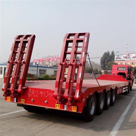 China 4 Axles 80tons Heavy Duty Leaf Spring Low Bed Truck Trailer Price Manufacturers and ...