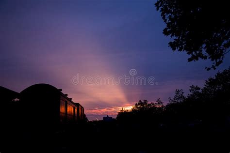 Train silhouette at sunset stock photo. Image of transportation - 65393262