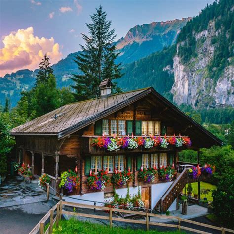 Swiss Alps & Vintage Cottage at Lauterbrunnen in the canton of Bern Switzerland. Giancarla ...