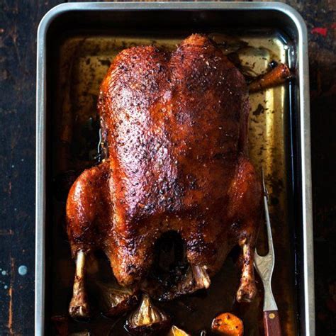 Crispy whole roast duck. The skin is lovely, crispy and the meat just falls off the bone, tender ...