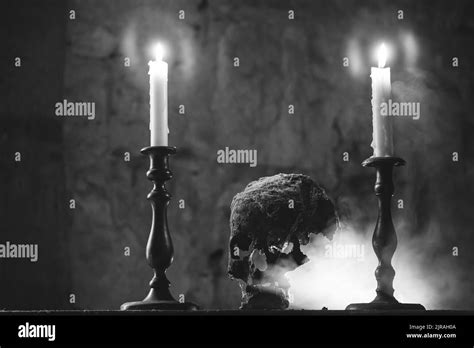 Real human skull with candles in the darkness. Spooky, horror wallpaper ...