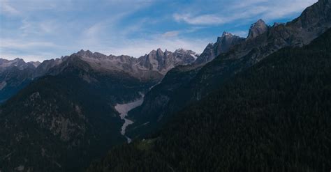 Aerial View of Rocky Mountains Under the Blue Sky · Free Stock Photo