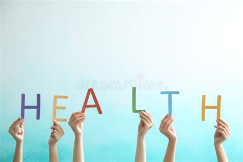 Young Women Making Word HEALTH with Letters on Color Background Stock Photo - Image of paper ...