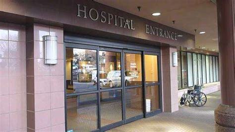 Hospital entrance doors, exterior with no people. - Stock Video Footage ...