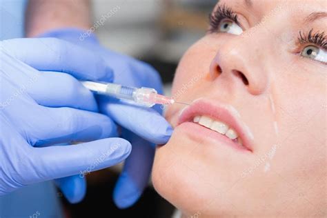 Hyaluronic acid injections — Stock Photo © microgen #115617810