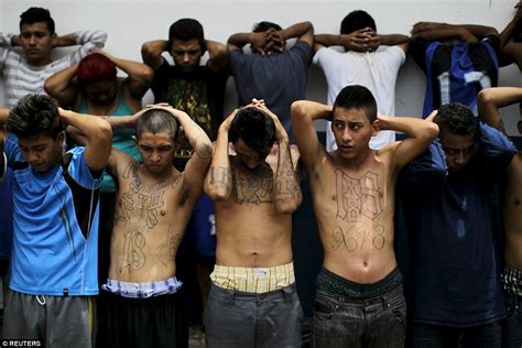 El Salvador's 18th Street gang members pose alongside their guns after police arrest | Daily ...