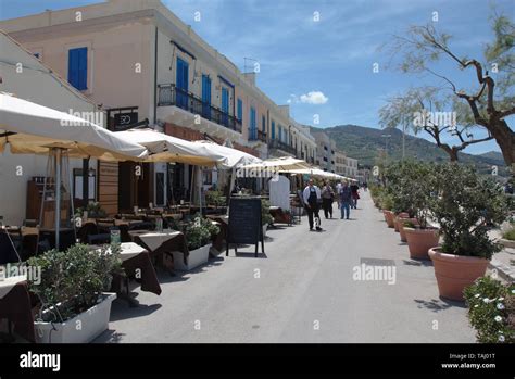 Seaside restaurants in Cefalu, Sicily Stock Photo - Alamy