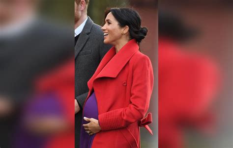 Meghan Markle Shows Baby Bump In Purple Dress & Red Coat