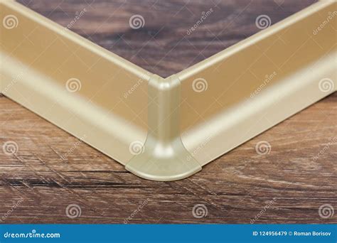 Installed Skirting on the a Wooden Wall Stock Image - Image of color, design: 124956479