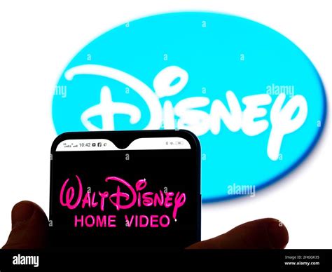 In this photo illustration, the Walt Disney Home Video logo is seen displayed on a smartphone ...