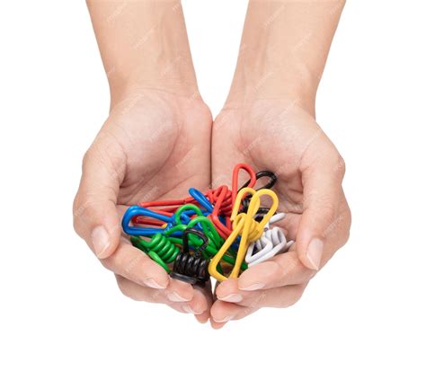 Premium Photo | Hand holding wire spring hose clips isolated on white ...