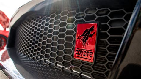 Red Coyote Badge on front grill of the Coyote Emblem Mustang | Mustang ...