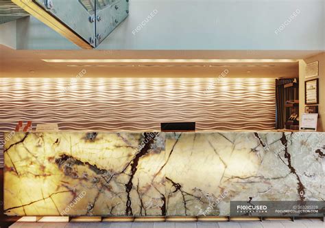 Marble reception desk in luxury hotel lobby — lavish, us - Stock Photo ...