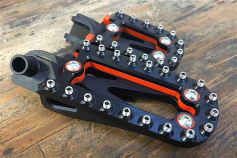 Fasst Co. Launches New Vibration Damping Adventure Footpegs - ADV Pulse