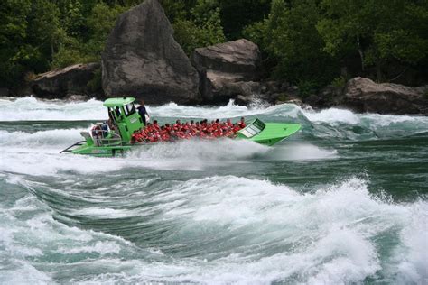 People riding the category 5 rapids of the Niagara River for a thrill. We just watched from the ...