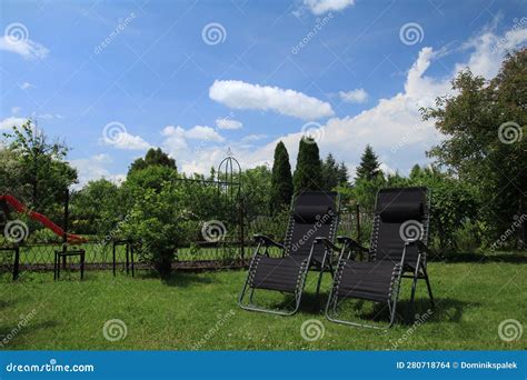 Black Sun Loungers in the Garden Stock Photo - Image of holiday, view: 280718764