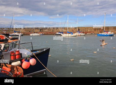 Fishin boats at old harbour in Dunbar, Scotland Stock Photo - Alamy