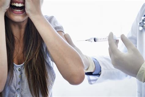 Premium Photo | Patient doctor and syringe injection with fear scream or needle for flu ...