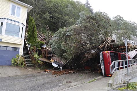 Crews begin removing landslide debris in Alaska's capital | AP News