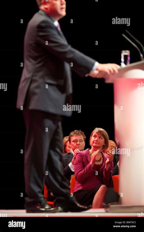 Yvette Cooper, looks on as husband Ed Balls addresses delgates ...