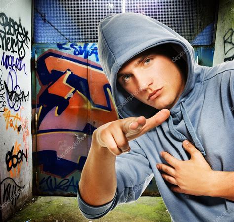 Hooligan in a graffiti painted gateway — Stock Photo © nejron #2085379