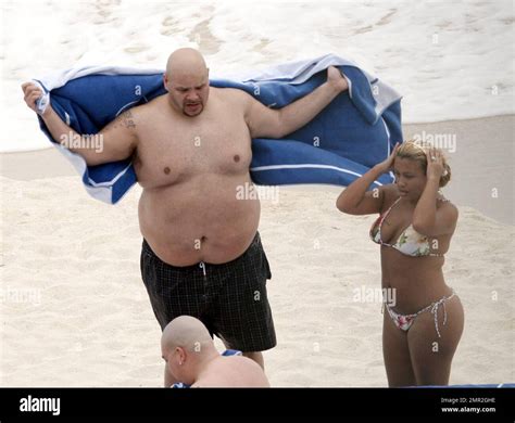 Exclusive!! Rapper Fat Joe (aka Fat Joe da Gangsta) beachside with his girlfriend in Mexico. 3/7 ...