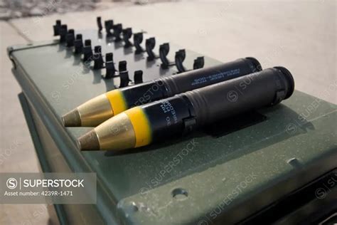 Apache 30mm M230 chain gun rounds - SuperStock